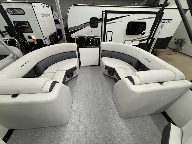 Slide: The Image of 2025 Harris Sunliner 230 interior with luxurious seating and modern design. - 21
