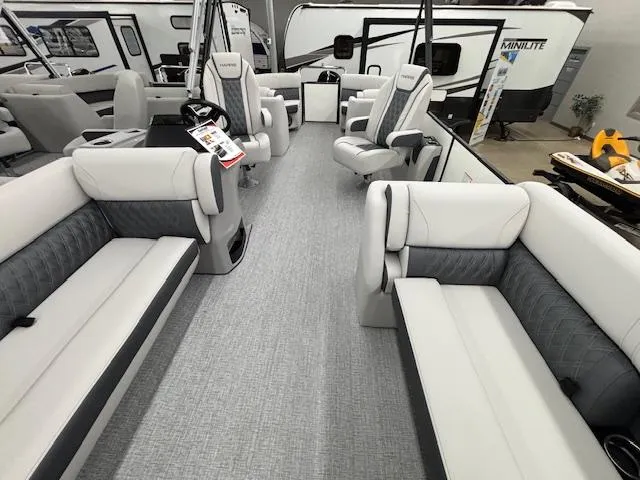 Slide: The Image of 2025 Harris Sunliner 230 interior with luxurious seating and modern design. - 25