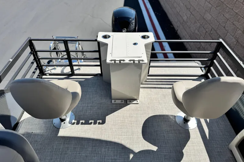 Slide: The Image of 2025 Flagship E22RF boat deck with two seats and control console. - 14