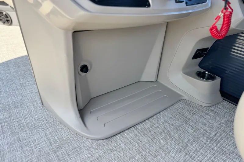 Slide: The Image of 2025 Flagship E22RF interior detail with cup holder and textured flooring. - 20