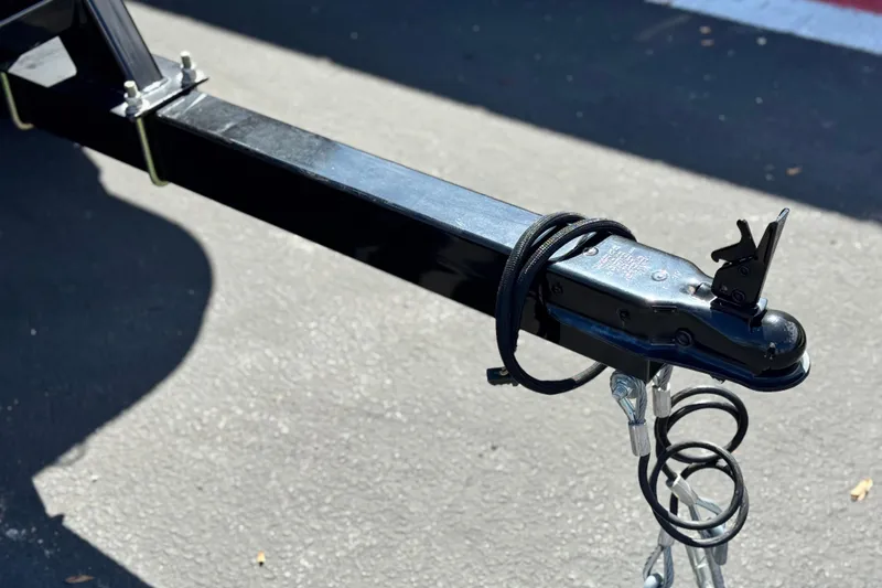 Slide: The Image of Trailer hitch of Flagship E22RF 2025 model on asphalt surface. - 22