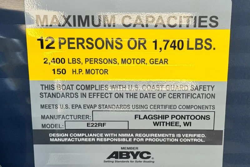 Slide: The Image of 2025 Flagship E22RF boat capacity label: 12 persons, 1,740 lbs, 150 HP motor. - 23