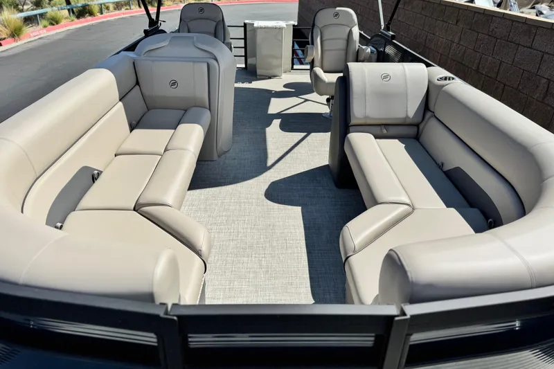 Slide: The Image of Luxurious seating on 2025 Flagship E22RF pontoon boat, featuring spacious beige upholstery. - 8