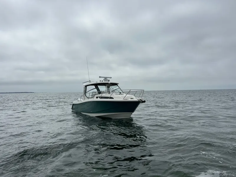 Slide: The Image of Boston Whaler 325 Conquest 2026 - 16