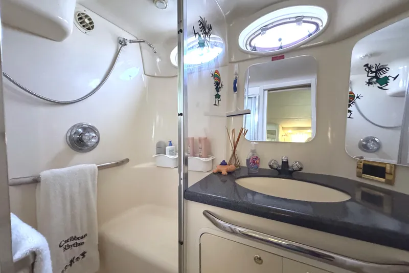 Slide: The Image of Luxurious bathroom in 1997 Sea Ray 370 Aft Cabin yacht with modern amenities. - 27