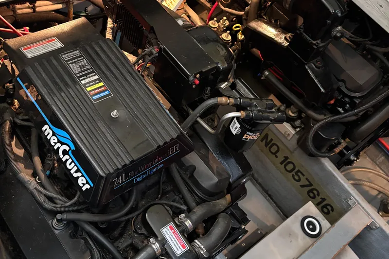Slide: The Image of Engine compartment of a 1997 Sea Ray 370 Aft Cabin with MerCruiser components. - 50