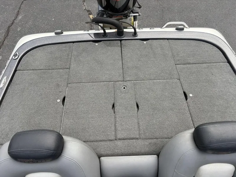 Slide: The Image of 2025 Skeeter FX 20 boat deck with gray carpet and seating. - 18