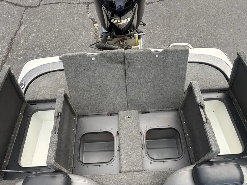 Slide: The Image of 2025 Skeeter FX 20 boat storage compartments and Yamaha 250 engine. - 20