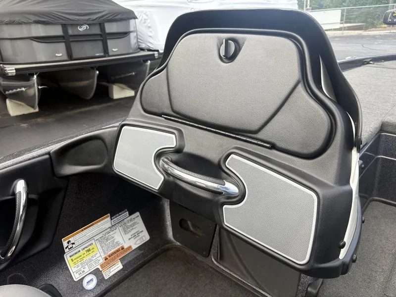 Slide: The Image of Interior of a 2025 Skeeter FX 20 boat, featuring sleek design and safety labels. - 6