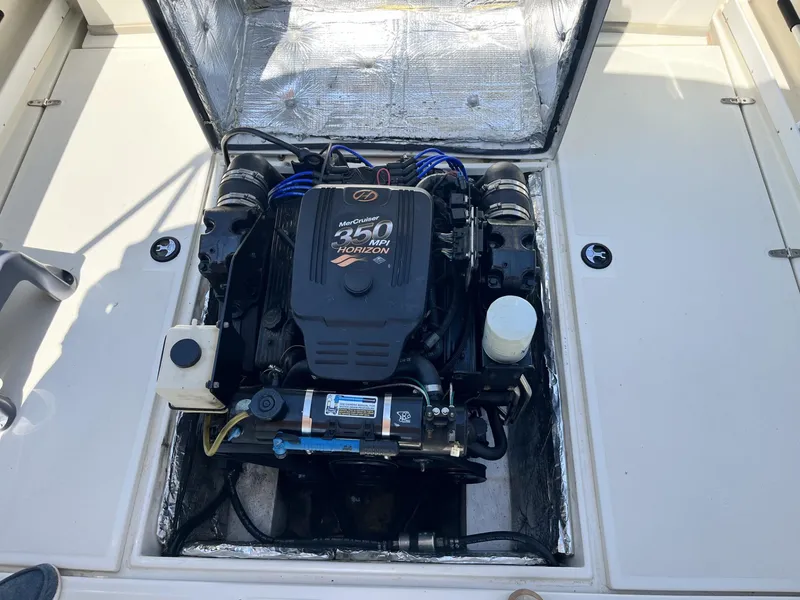 Slide: The Image of Engine compartment of a 2002 Limestone 24 Cuddy Cabin with MerCruiser 350 MPI Horizon engine. - 26