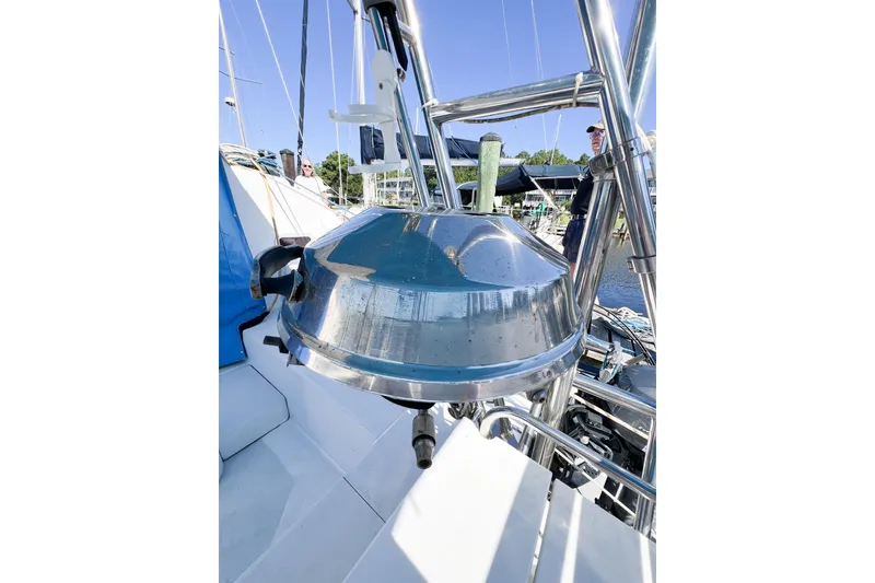 Slide: The Image of Stainless steel grill on 2012 TomCat 9.70 s sailboat deck, sunny marina background. - 11