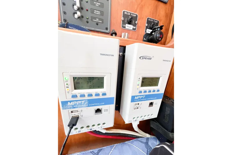 Slide: The Image of MPPT solar charge controllers in a 2012 TomCat 9.70 s boat interior. - 30