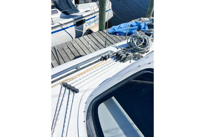 Slide: The Image of Deck of 2012 TomCat 9.70 s sailboat with ropes and pulleys. - 55