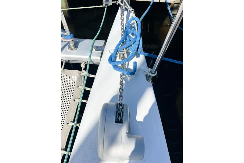 Slide: The Image of Deck of 2012 TomCat 9.70 s sailboat with blue rope and anchor chain. - 56