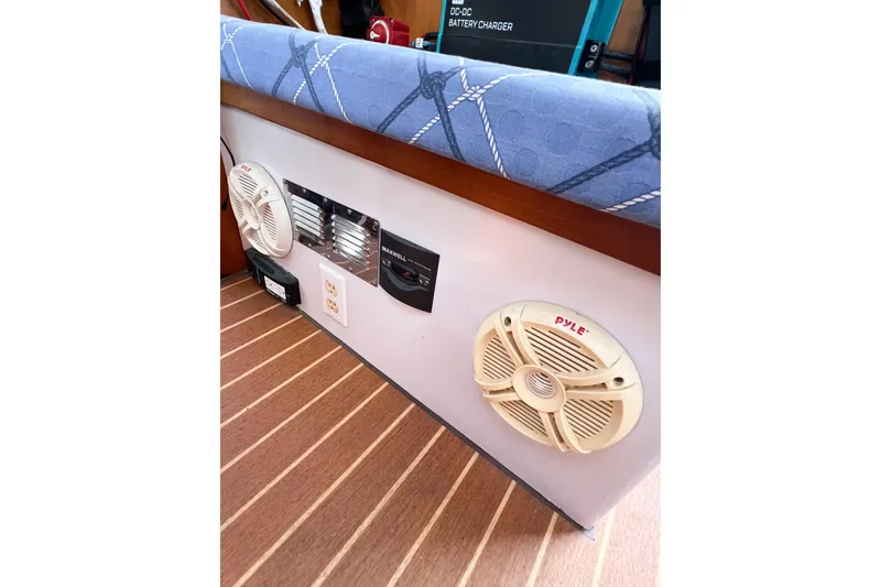Slide: The Image of Interior of 2012 TomCat 9.70 s boat with speakers and control panel. - 61