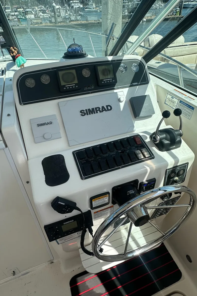 Slide: The Image of Control panel of a 2006 Tiara Yachts 2900 with Simrad navigation system. - 10