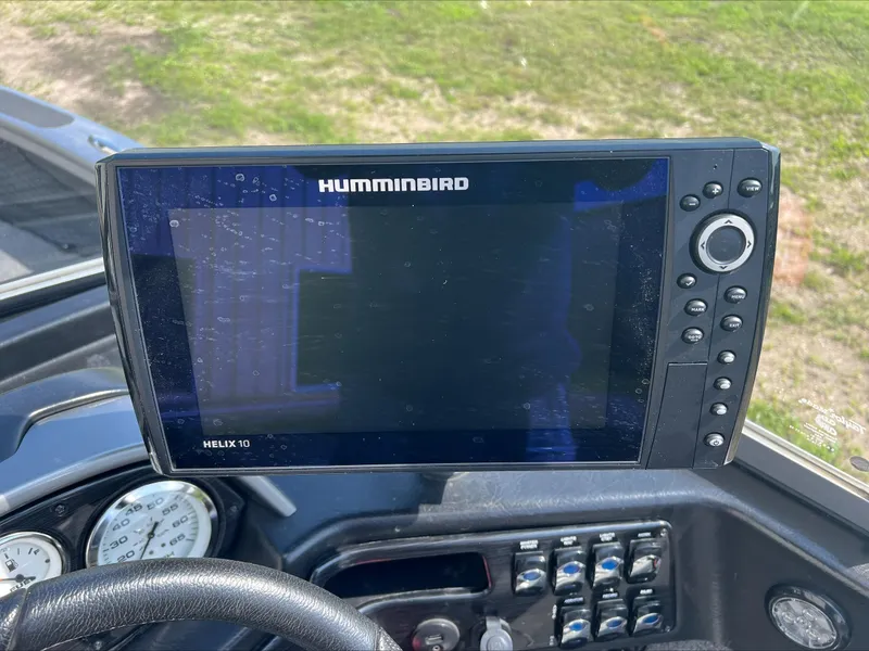 Slide: The Image of Helix 10 fish finder on 2016 Crestliner Raptor 1850 boat dashboard. - 12
