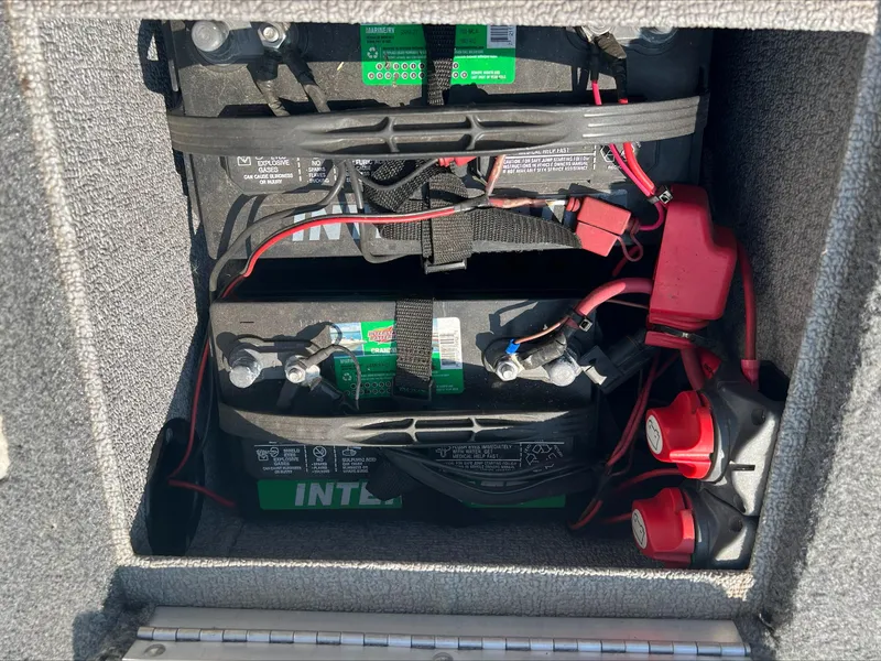 Slide: The Image of Battery compartment of a 2016 Crestliner Raptor 1850 boat with wiring and connectors. - 17