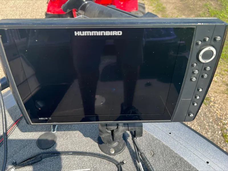 Slide: The Image of Humminbird Helix 12 fish finder on 2016 Crestliner Raptor 1850 boat dashboard. - 5