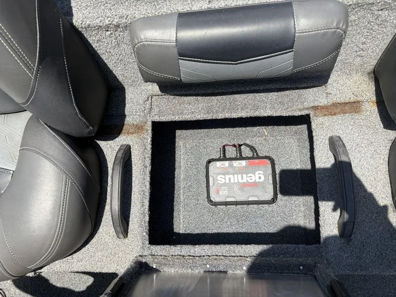 Slide: The Image of 2019 Tracker Pro Team™ 195 TXW boat interior with battery compartment and seating. - 14