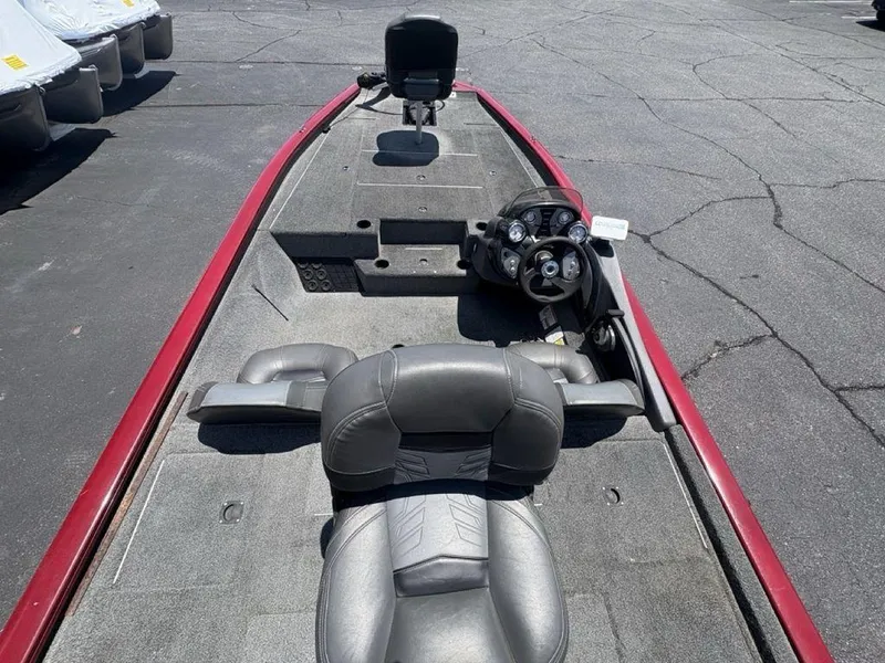 Slide: The Image of 2019 Tracker Pro Team™ 195 TXW boat interior with steering console and seating. - 21
