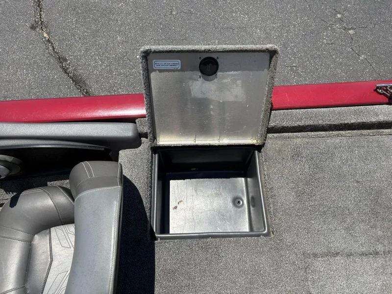 Slide: The Image of Open storage compartment on 2019 Tracker Pro Team™ 195 TXW boat deck. - 22