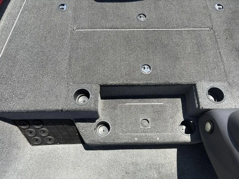 Slide: The Image of 2019 Tracker Pro Team™ 195 TXW boat deck with storage compartments and cup holders. - 5