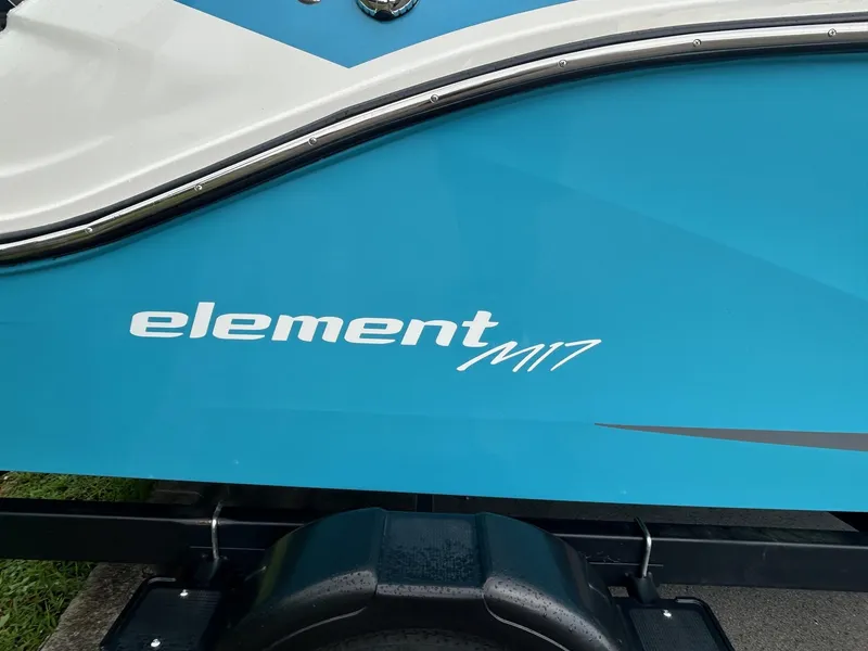 Slide: The Image of 2023 Bayliner Element M17 boat side view with logo. - 3