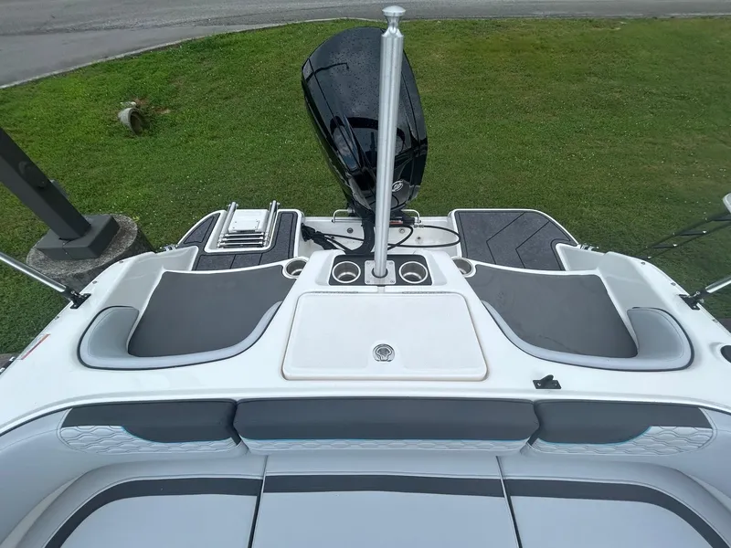 Slide: The Image of 2023 Bayliner Element M17 boat interior with seating and motor, viewed from above. - 7