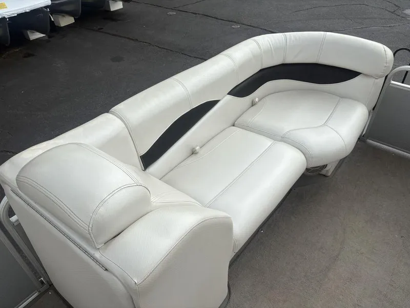 Slide: The Image of White leather seating on a 2013 Godfrey AP250 RL boat. - 12