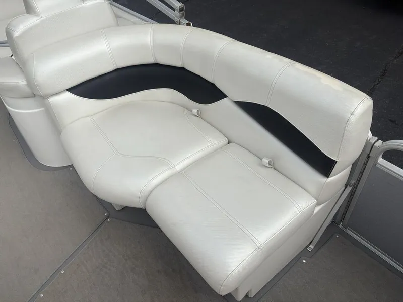 Slide: The Image of White and black seating on 2013 Godfrey AP250 RL boat. - 13