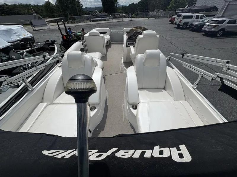 Slide: The Image of 2013 Godfrey AP250 RL pontoon boat with white seating and Aqua Patio cover. - 23
