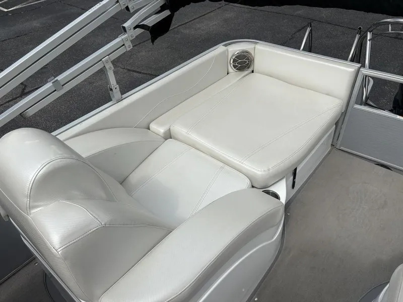 Slide: The Image of White leather seating on a 2013 Godfrey AP250 RL boat. - 27