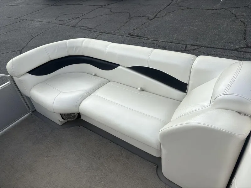 Slide: The Image of White leather seating on a 2013 Godfrey AP250 RL boat. - 3