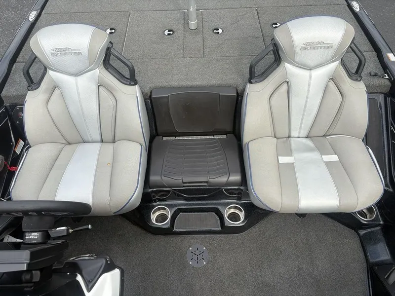 Slide: The Image of 2023 Skeeter ZXR 20 boat interior with dual gray seats and cup holders. - 20
