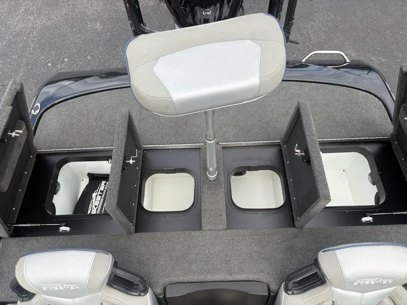 Slide: The Image of 2023 Skeeter ZXR 20 boat storage compartments with open lids and seating area. - 27