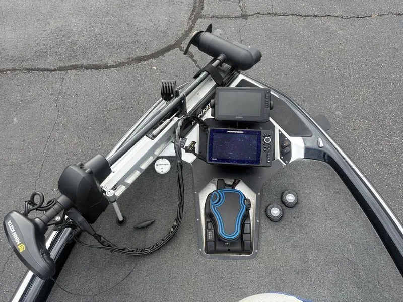 Slide: The Image of 2023 Skeeter ZXR 20 boat with Garmin and Humminbird fish finders on the dashboard. - 3