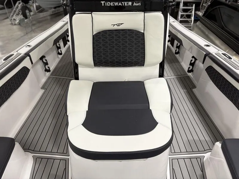 Slide: The Image of 2026 Tidewater 2700 CB boat interior with sleek seating and modern design. - 14