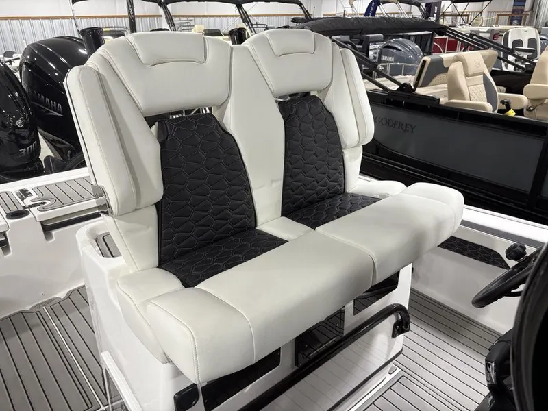 Slide: The Image of Luxury seating on 2026 Tidewater 2700 CB boat, featuring sleek design and premium materials. - 27