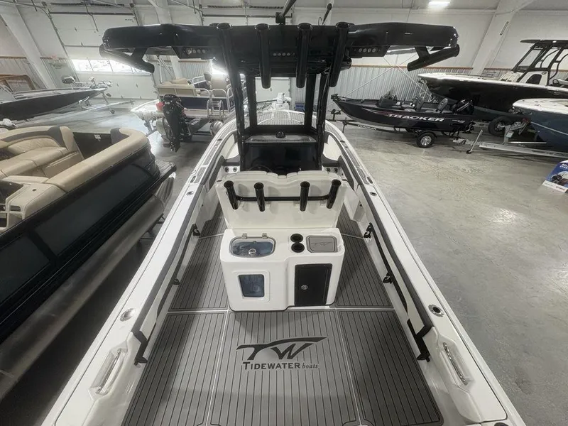 Slide: The Image of 2026 Tidewater 2700 CB boat interior in showroom, featuring sleek design and modern amenities. - 36