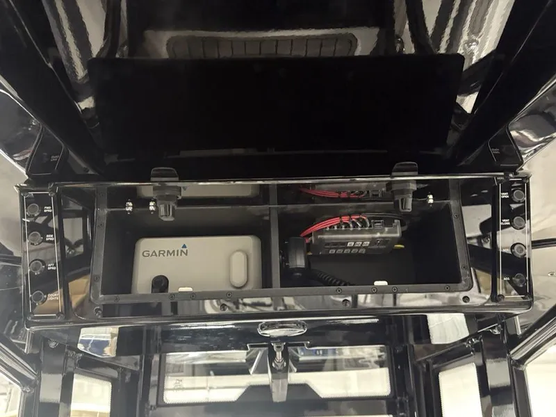 Slide: The Image of Tidewater 2700 CB 2026 console with Garmin device and control panel. - 37