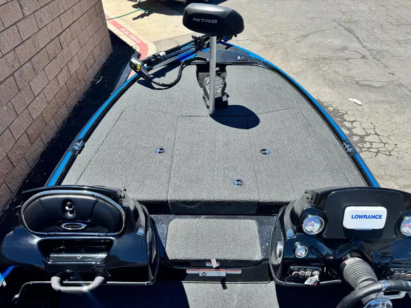 Slide: The Image of 2024 Tracker Z17 boat deck with Nitro seat and Lowrance electronics. - 11