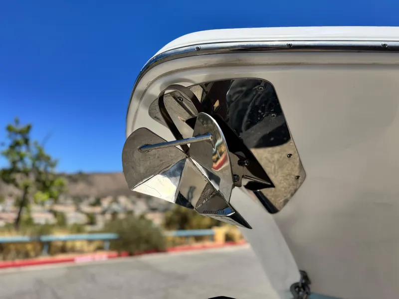 Slide: The Image of Close-up of a 2022 Tidewater 232 CC boat propeller against a clear blue sky. - 7