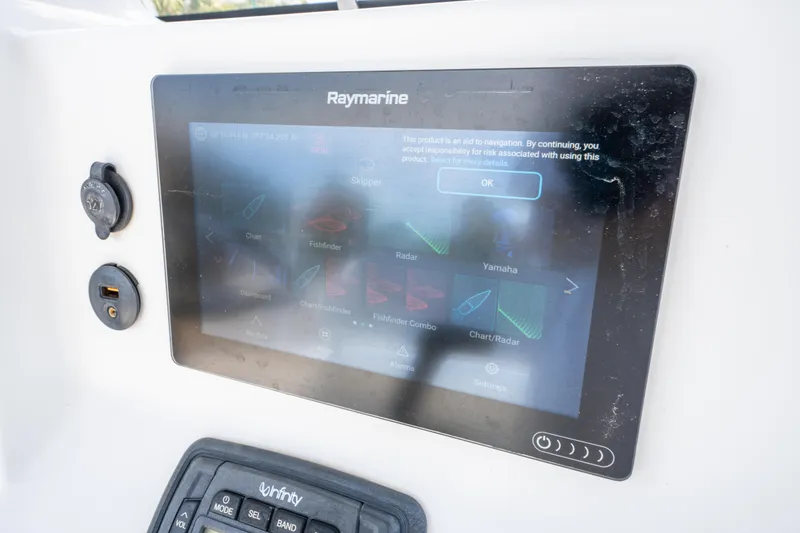 Slide: The Image of Raymarine navigation display on 2014 Sea Hunt 196 ULTRA CENTER CONSOLE boat. - 11