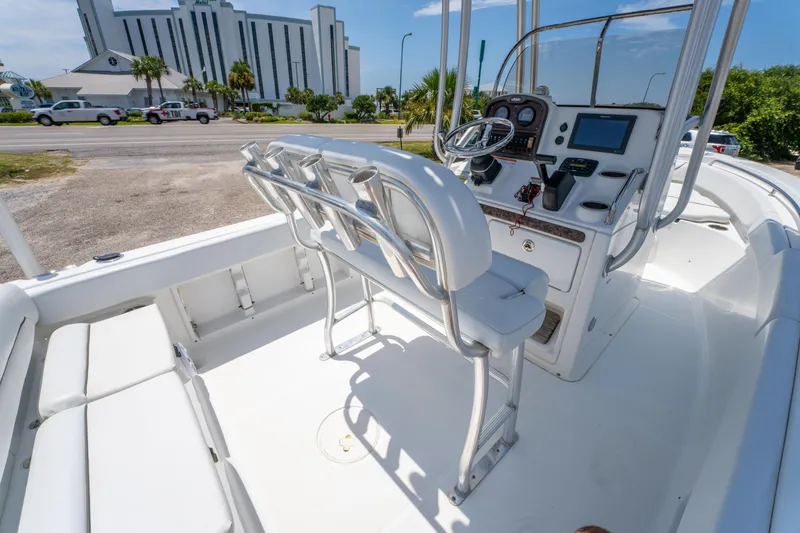 Slide: The Image of 2014 Sea Hunt 196 Ultra Center Console boat interior with helm and seating. - 14