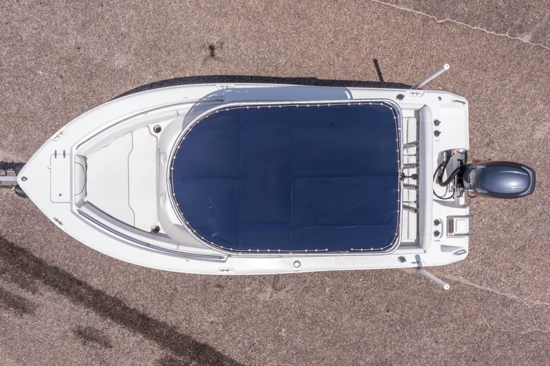 Slide: The Image of Top view of 2014 Sea Hunt 196 Ultra Center Console boat on pavement. - 20