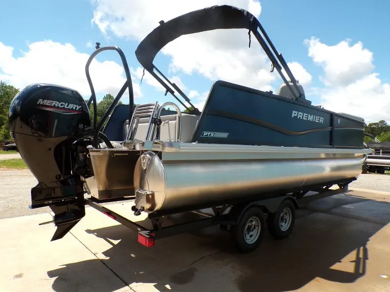 Slide: The Image of 2025 Premier 220 SUNSCAPE RL pontoon boat with Mercury outboard motor on trailer. - 3