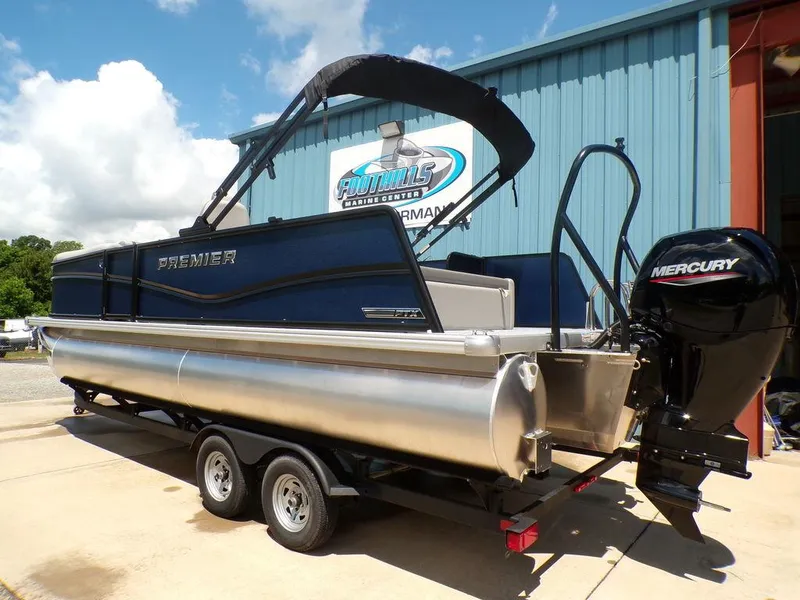 Slide: The Image of 2025 Premier 220 SUNSCAPE RL pontoon boat with Mercury engine on trailer. - 8