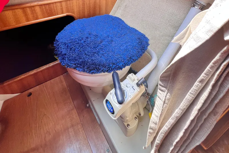 Slide: The Image of Vintage Aphrodite 101 boat toilet with blue cover, 1978 model. - 14