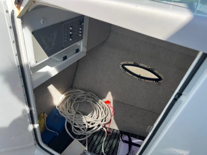 Slide: The Image of 2004 Formula 280 Bowrider cabin interior with rope and control panel. - 15